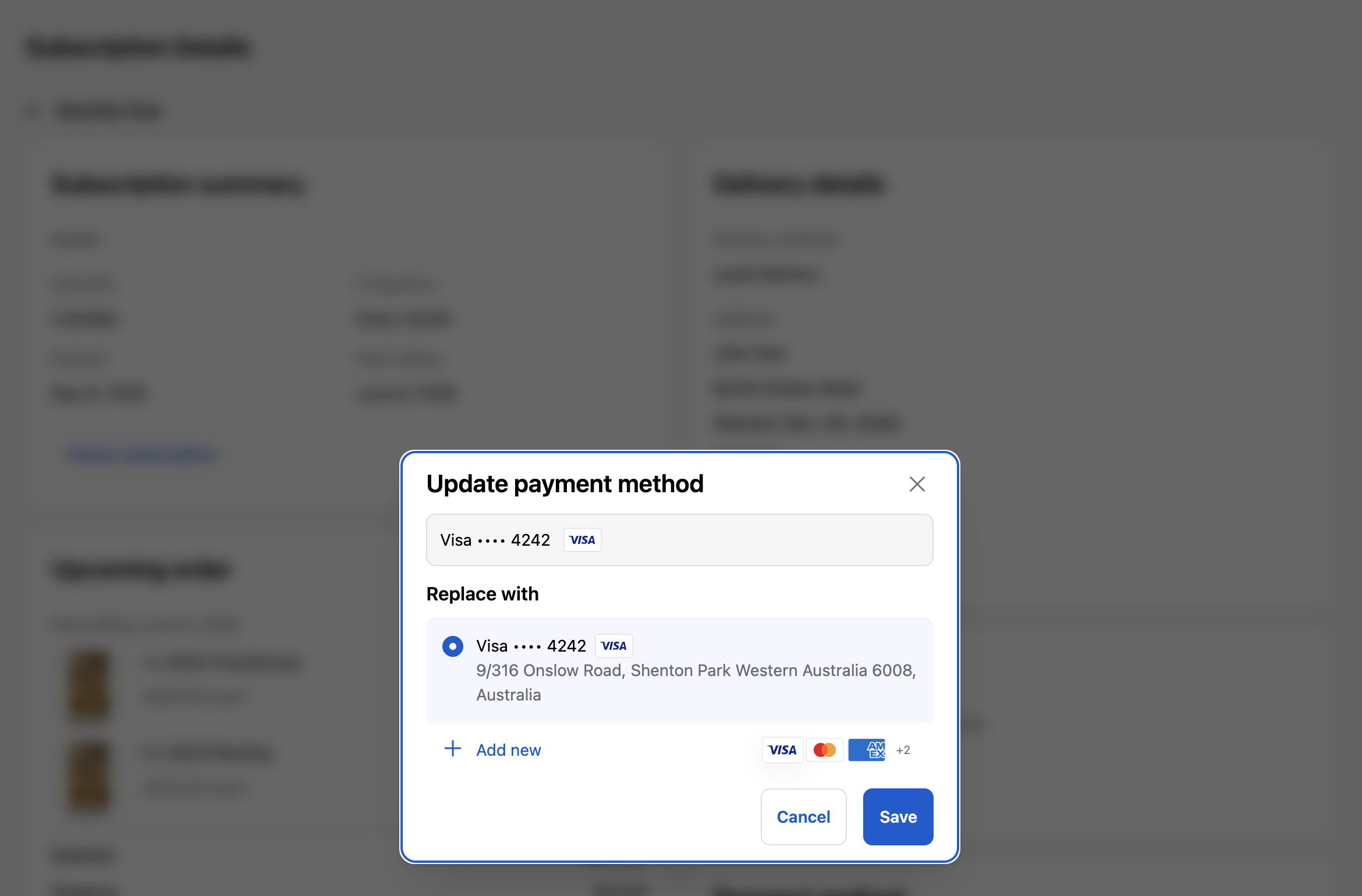 Customer portal inline modal showing the current card on file with options to switch to another saved card or add a new one